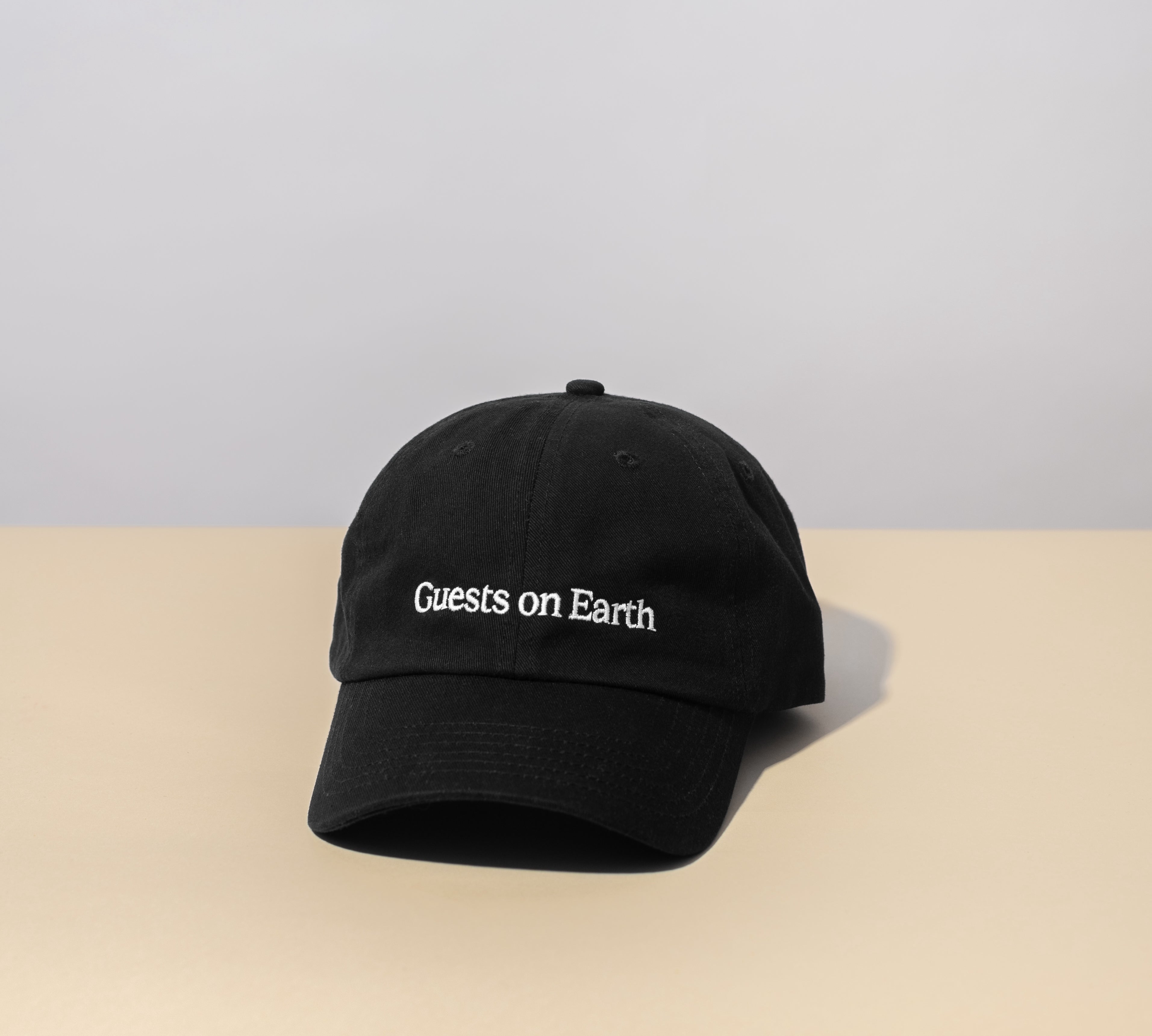 Guests on Earth Ambassador Cap